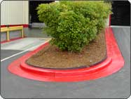Bright Red Concrete Curb Paints.