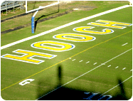 Letter stencil end zone football field painting